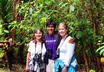 Posing with guide while birding in the Amazon Rainforest