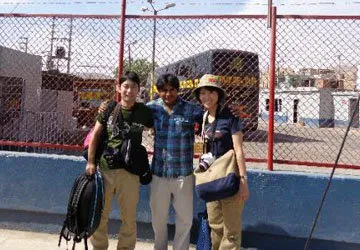 Photo op at the Cruz del Sur bus station in Nazca