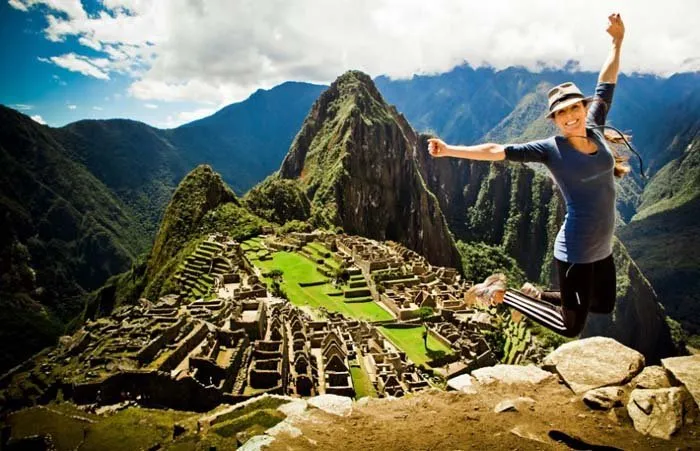 Visiting the Inca Ruins of Machu Picchu near Cusco, Peru.
