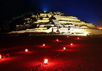 The brilliantly lit Caral ruins at night, in Peru's coastal 