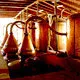 Distilling Pisco in traditional vineyard bodega in Ica, Peru