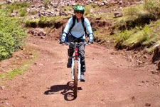 Downhill biking along a circuit of ruins and towns on Cusco 