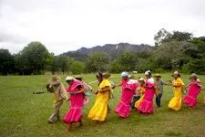 Children dancing in San Miguel de Bala community in Bolivia 