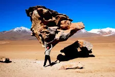 Carrying the tree stone in the Siloli Desert in the Uyni Sal
