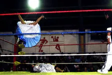 Cholita getting flipped during wrestling showdown in La Paz,