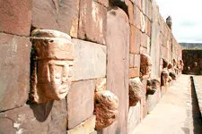 Carved heads along the ruins of Tiawanaku in Bolivia alongsi