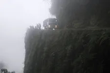 Dangerous curve along death road from La Paz to Coroico, Bol
