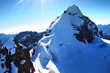 Snow-covered Austria Peak on the Tuni trail near La Paz, Bol