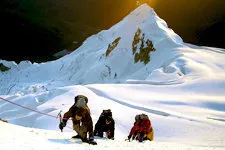 Group scaling Mount Huayna Potosi near La Paz, Bolivia.