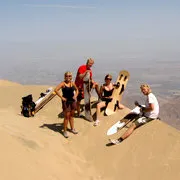 Cover Photo. Sandboarding by Huacachina Oasis near Nazca, Pe