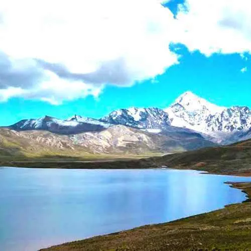 Cover Photo. Trekker by Condoriri Lake in Chacapampa Valley,